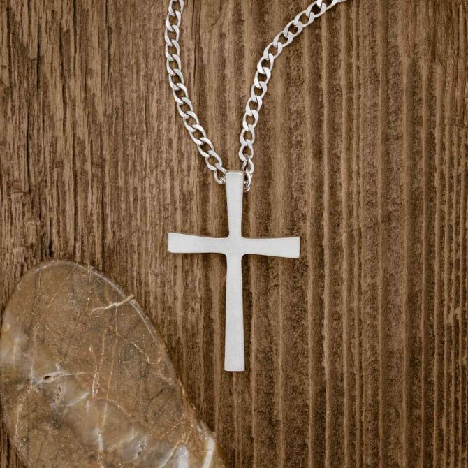 pewter Set Free Cross Necklace, on wood background