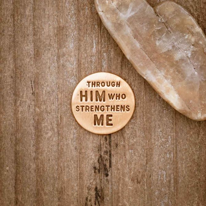 Personalized Bronze Through Him Golf ball marker, on wood background