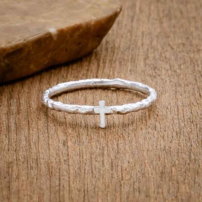 sterling silver Dainty Rugged Cross Ring, on wood background