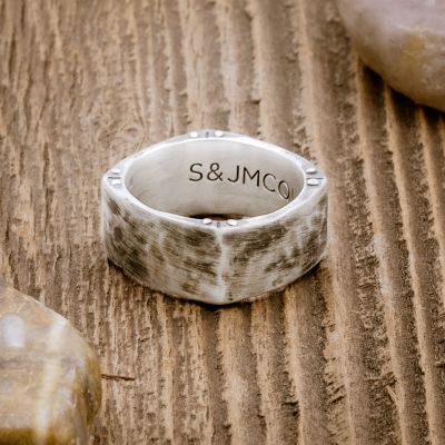 Strong + True ring handcrafted in sterling silver and hammered to an antiqued finish and personalized with a meaningful name, word or date